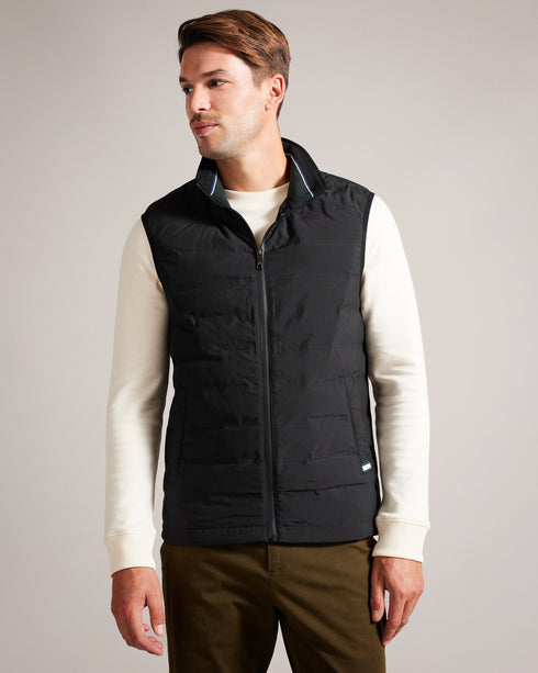 NEWWARK-Outerwear-Say yes to effortless style with the NEWWARK gilet. A gilet is the perfect lightweight coverup for warmer weather and this one's funnel neck and padding keep out the breeze. Gilet Pockets Zip fastening Funnel neck Padded Magnolia label- Ted Baker Romania